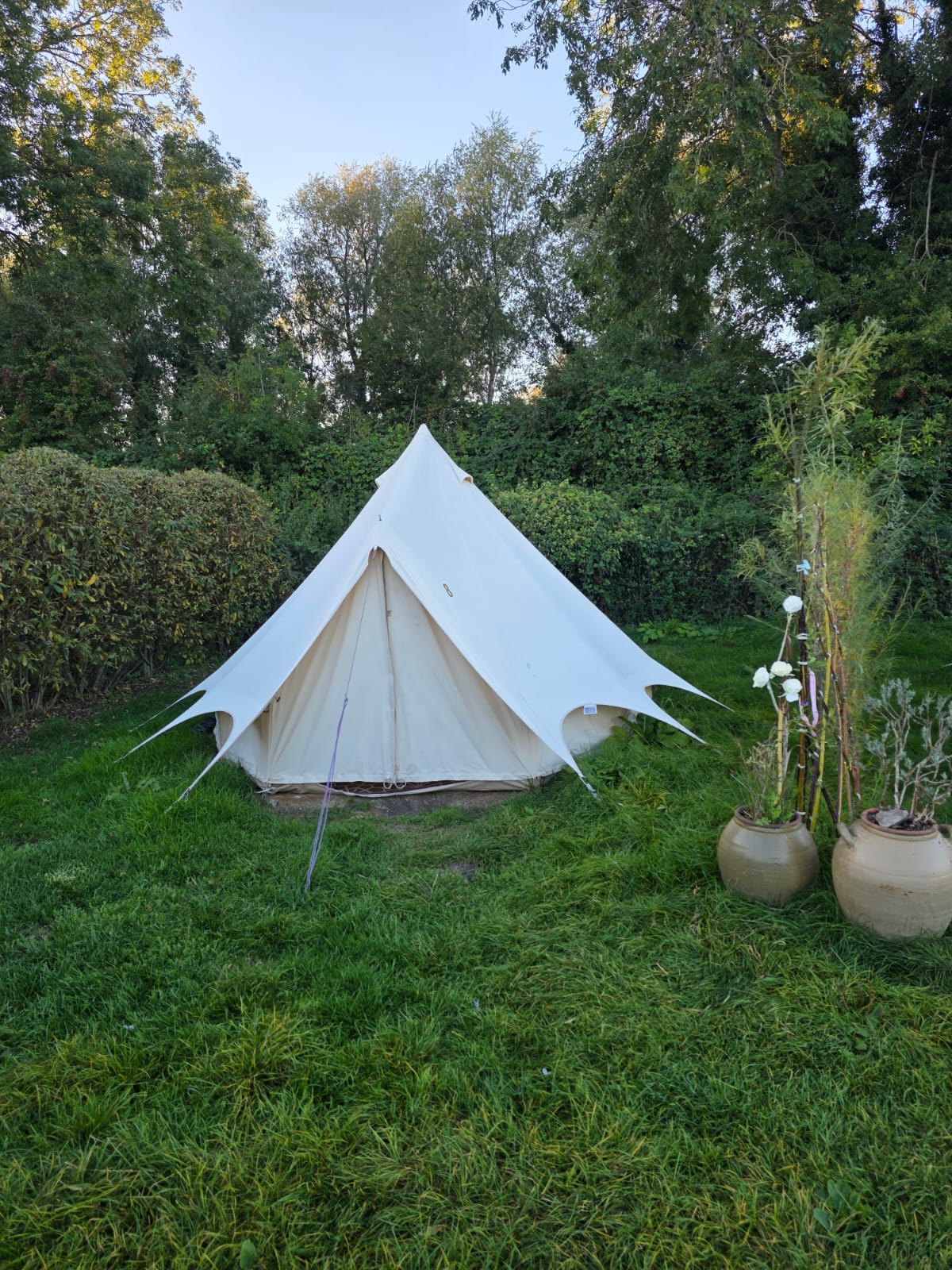 A furnished bell tent pitched in its own quiet corner
